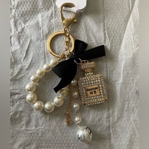 Perfume bottle shaped keychain